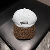 New four-season can wear retro splicing leopard print denim baseball cap men's and women's design sense letter embroidery cap