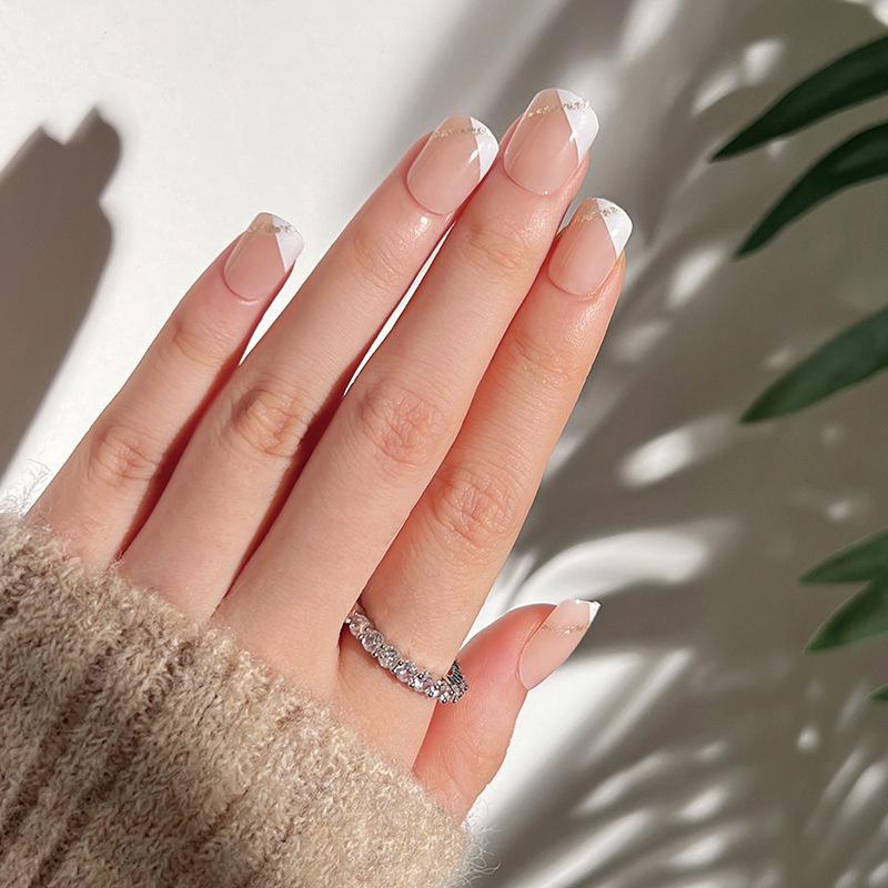 

Nail Art Short Beveled White French Nails with Gold Line Stickers