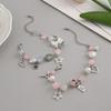 Bowknot Tassel Bracelet with Faux Pearl Accents Fashionable Bowknot Tassel Bracelet for Girls Showcasing Elegance