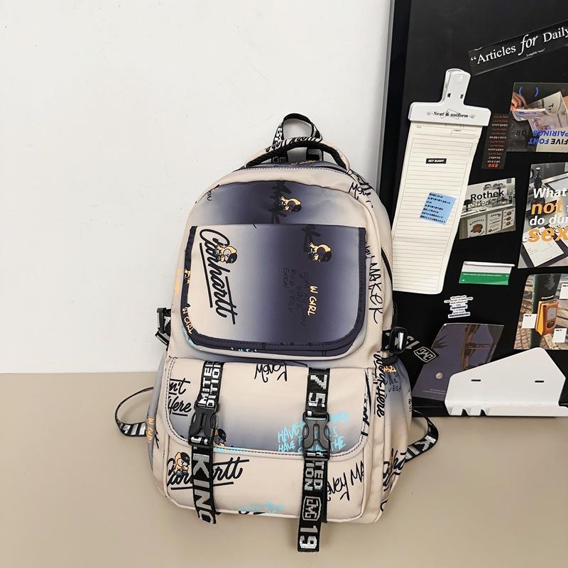 

New student backpack, junior high school student schoolbag, large-capacity spine protection, wear-resistant multi-compartment versatile schoolbag