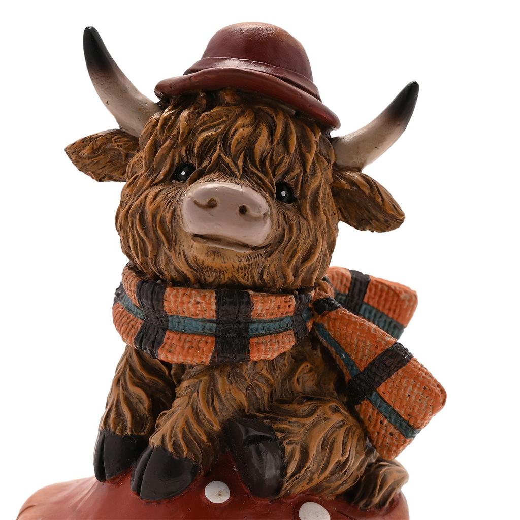 Country Living Highland Cow on Mushroom