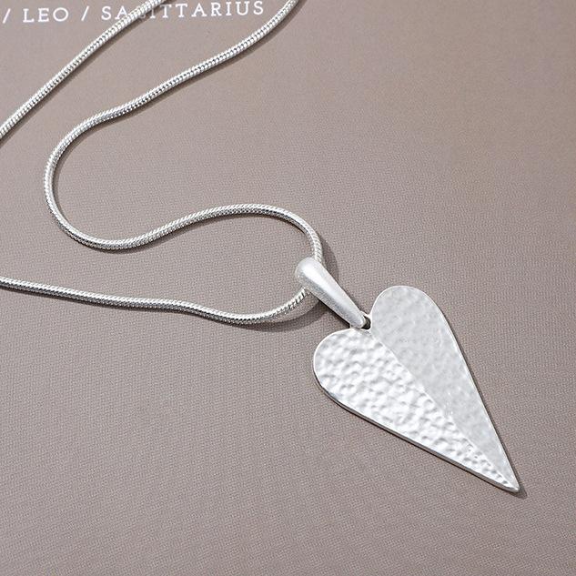 Hollow geometric flower love long necklace, women's exaggerated high-end irregular brushed pendant