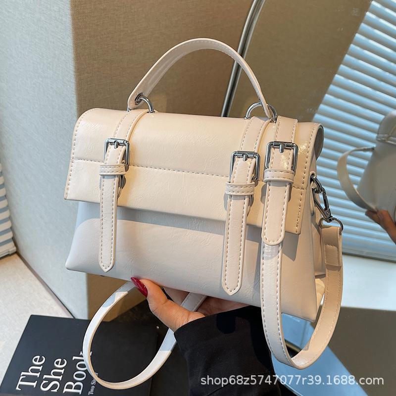 Retro preppy style large-capacity handbag women's 2025 pre-spring new Korean solid color shoulder bag textured messenger bag