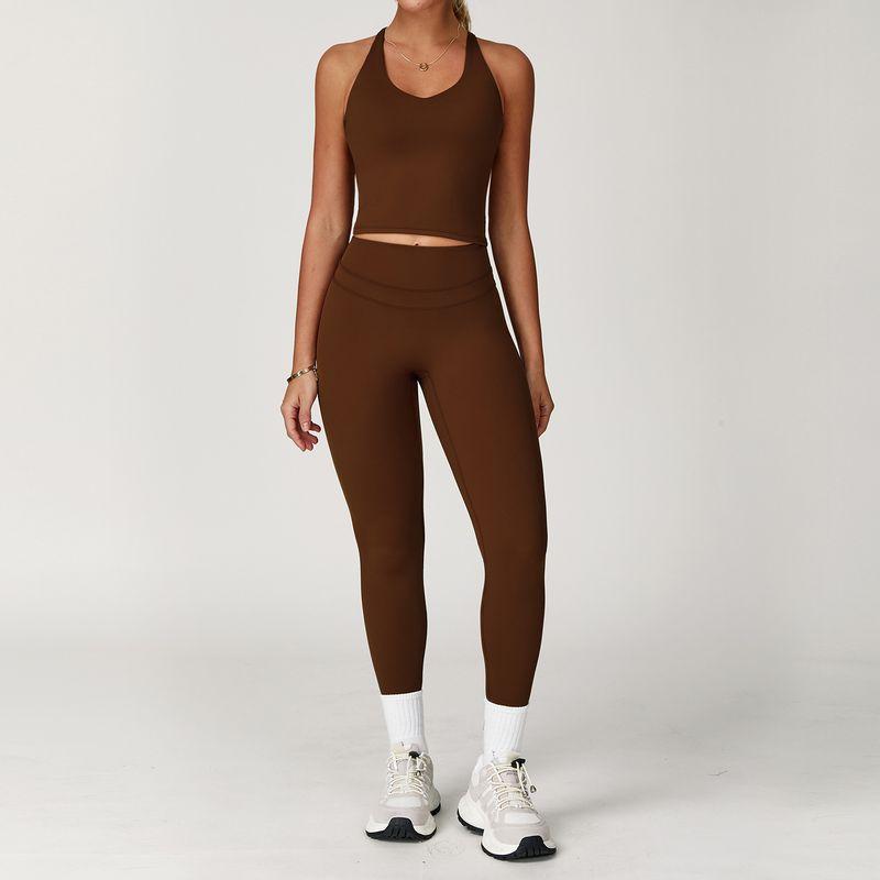Guangzhou Zechuang Clothing Co., Ltd. Brushed Tight Back Yoga Suit Stretch High Waist Workout Clothes for Women Running