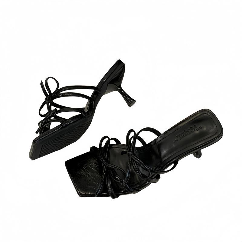 2025 Sommer neue Feenstil High-Heel coole Hausschuhe tragen dünnen Riemen Schleife mit Rock Temperament Hausschuhe Frau