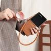 Коричневий шкіряний протиударний чохол для Samsung Z Flip7 з ремінцем проти втрати та магнітною застібкою