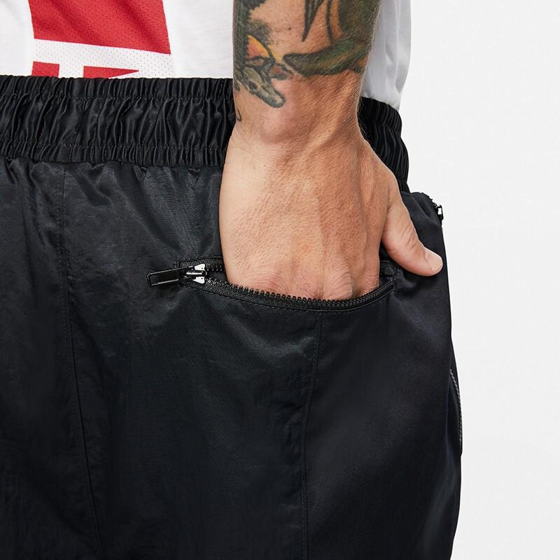 Jordan Pánské zúžené červené tepláky s logem Jumpman Černé AV1306-010