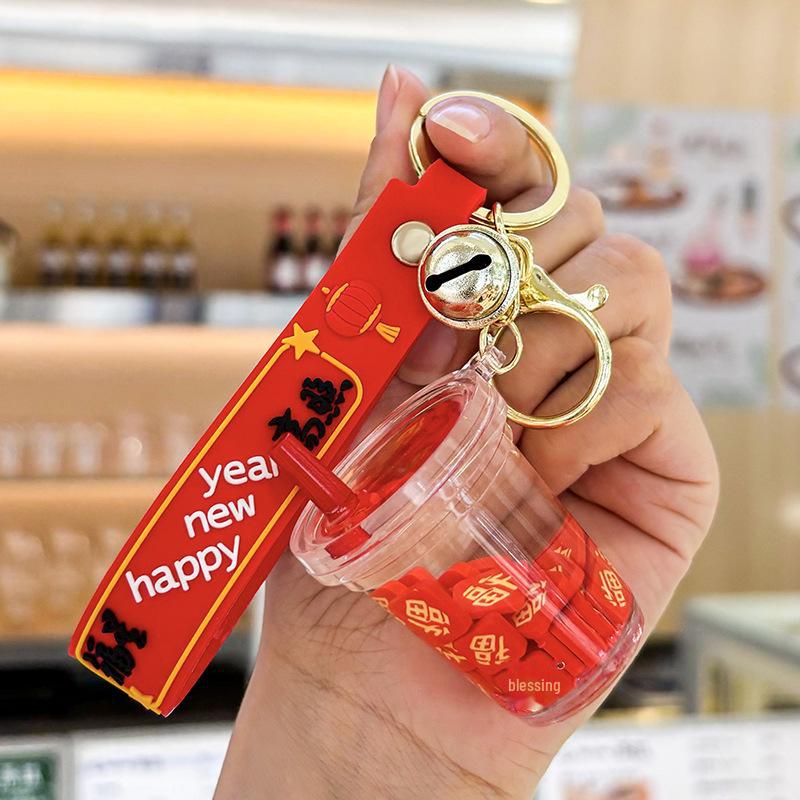 Akrylový přívěsek na klíče s tekutým pískem a obsahem oleje - Perfektní malý dárek na tašku nebo do auta.