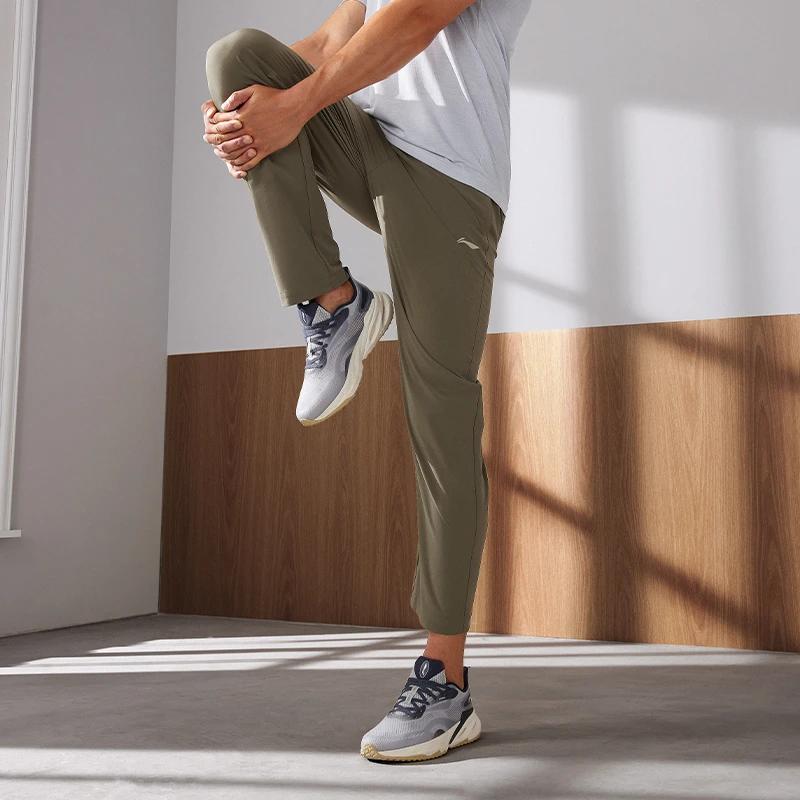 Li-Ning Fitness Series Solid Color Logo Elastic Waist Straight Leg Quick Dry Knitted Sports Pants Men pants Military-Green AYKT205-3