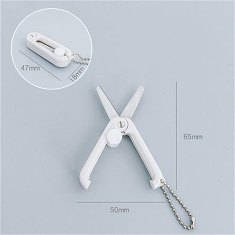 

Mini Portable Portable Small Scissors Creative Paper-cutting Notebook Tool That Can Be Extended and Folded
