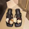 Fairy wind flower slippers female summer wear 2025 new fashion versatile flat bottom non-slip beach French cool slippers