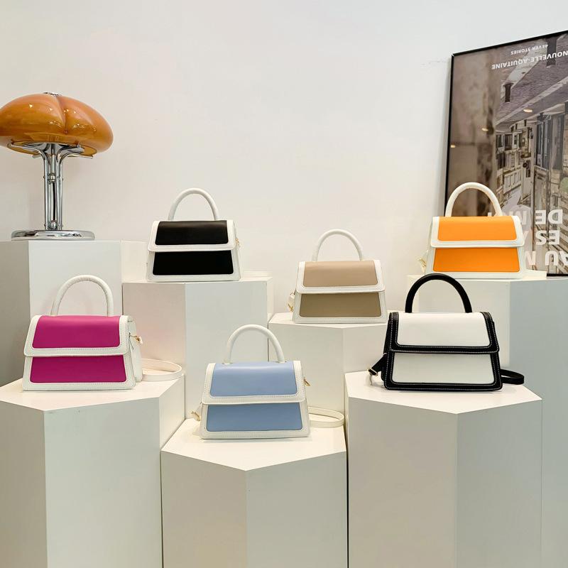 Splicing color clamshell type casual summer new simple Korean version fashionable foreign style women's hand carry shoulder small square bag soft
