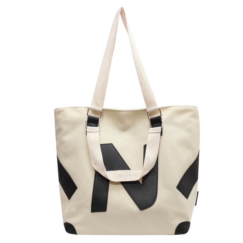 

Women s niche tote bag Korean version bag double-sided embossed letters large-capacity messenger bag tote bag class shoulder bag белый