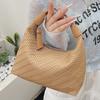 French Niche Woven Pattern Handbag Women's 2025 Spring and Summer Simple and Elegant Dumpling Bag Commuter Texture Messenger Bag