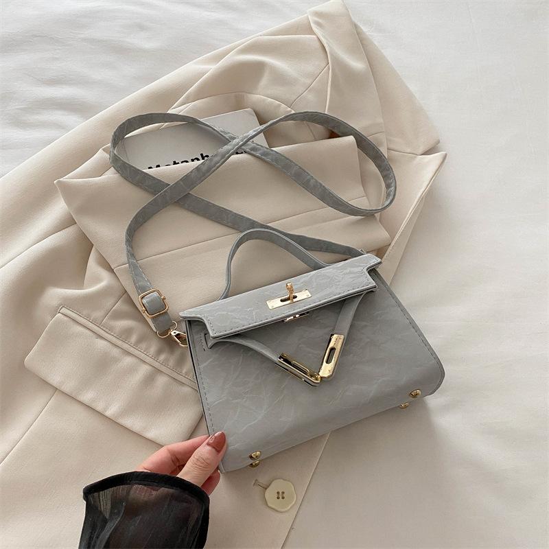 Einfarbige Handtasche mit einfacher Textur, Frühlings- und Sommer-Nischendesign, vielseitige Handtasche, Schultertasche