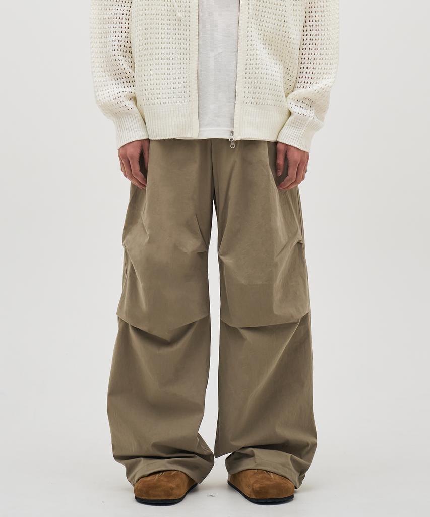 BASEMOMENT Cn Wide Parachute Pants Light Khaki
