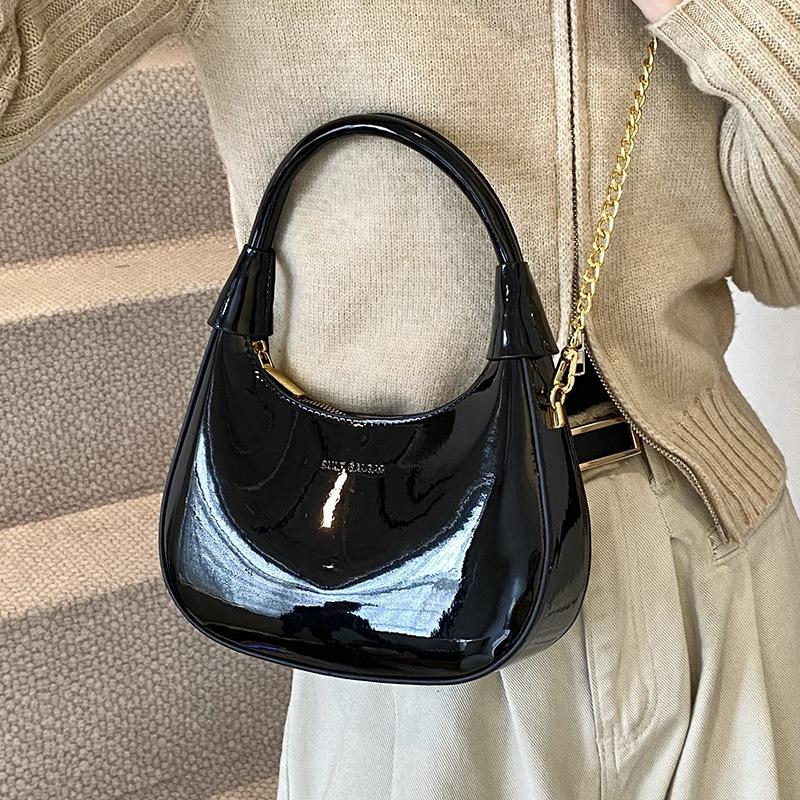 New fashion high-end texture patent leather portable crescent bag temperament light luxury versatile commuter messenger women's bag