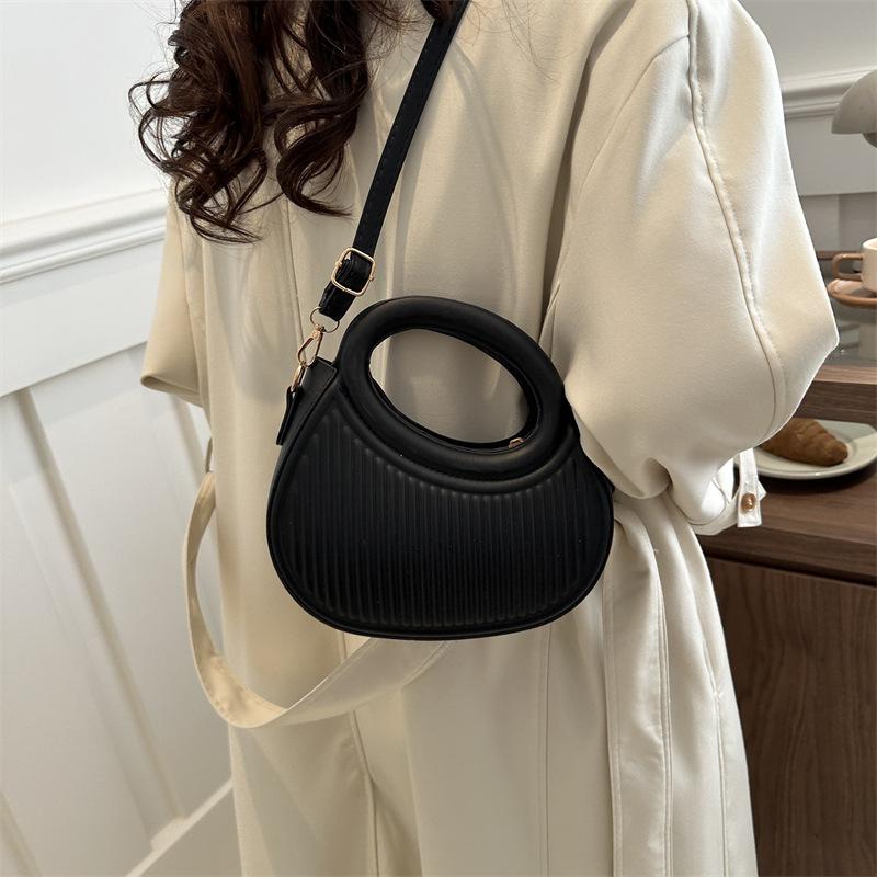 Solid color handbag women's 2025 early new fashion casual messenger bag portable small bag