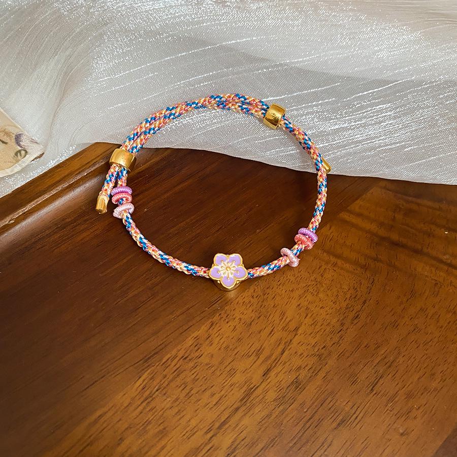 Chinese Style Woven Cotton Rope Geometric Bracelet with Copper Coin Design - Versatile, Fashionable, and High-end Jewelry