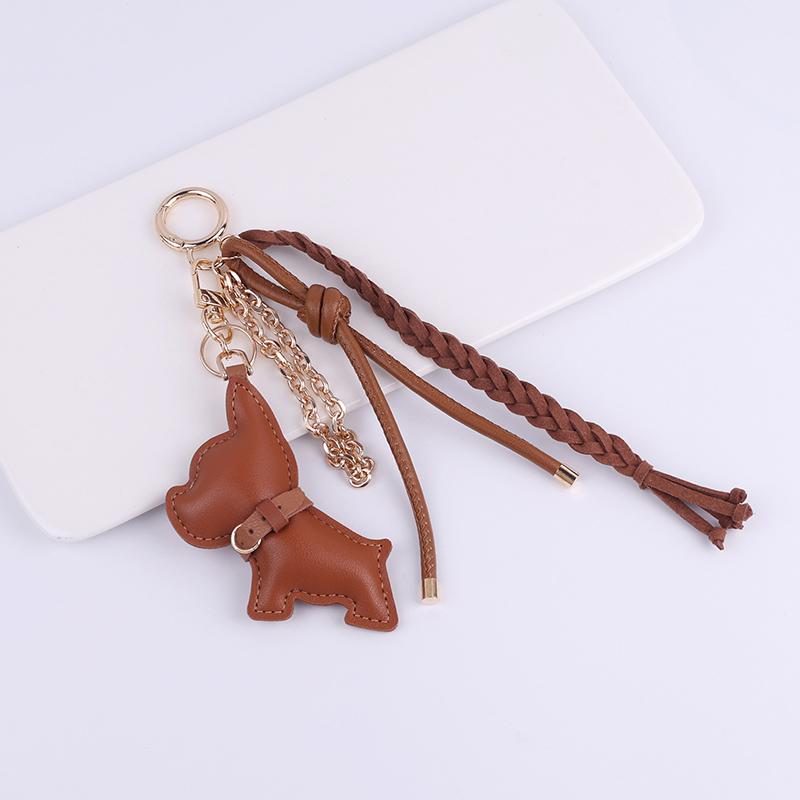 Skórzany breloczek z pieskiem dla kobiet ozdoba kreatywny wisiorek ze sznurka prezent dla studentów przyjaciół rodziny