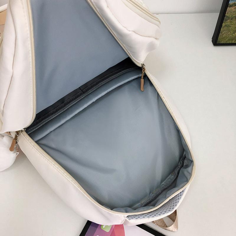 New high-value backpack, light and cute, large-capacity contrasting color and simple student backpack for junior high school and high school students