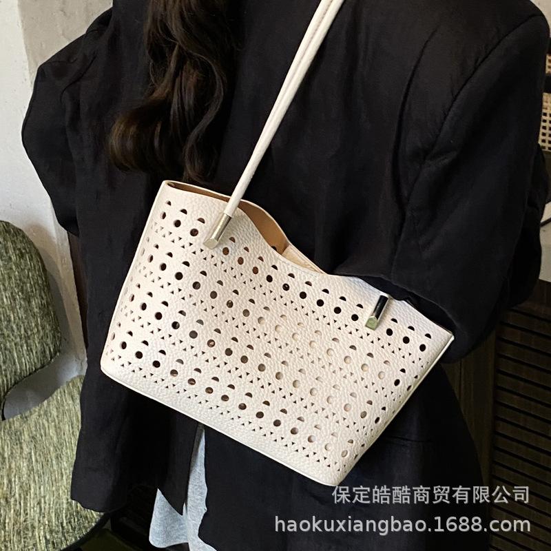 Large-capacity hollow bag women's summer 2025 new versatile shoulder mother and child bag leisure work commuter tote bag