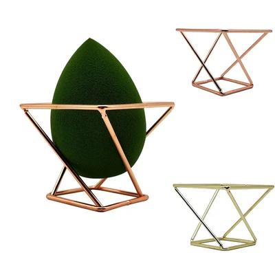 Estantería tridimensional creativa de hierro forjado para esponjas de maquillaje, soporte para huevos de belleza, soporte de secado de metal.