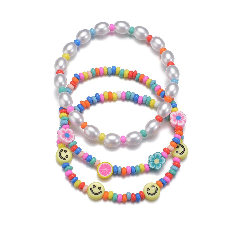 3-piece set of Bohemian style colorful rice beads mixed with smiling face pearls, multiple layered women's anklets