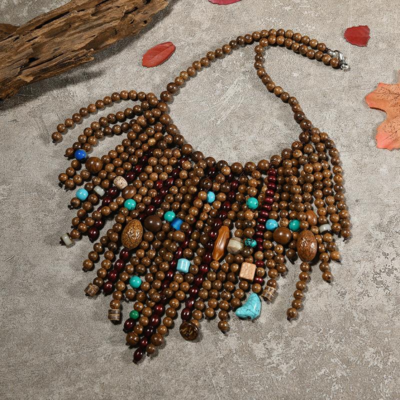 Schwere handgefertigte Holzperlenkette Vintage Bohemian Nische Übertriebene Persönlichkeit Quaste Pulloverkette Damen