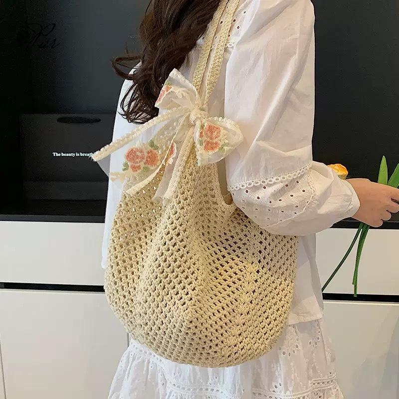 Summer super fire woven bag women's new literary and artistic style wool knitted vacation beach bag shoulder messenger bag