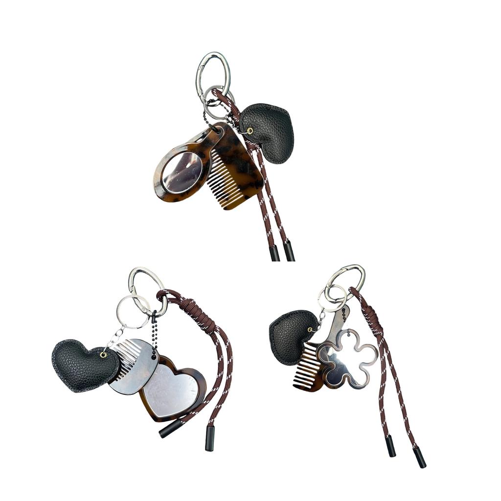 Kreative Designs Multifunktionaler Schlüsselanhänger Kamm Spiegel Tragbares Haarwerkzeug und Kosmetikzubehör für den täglichen Gebrauch