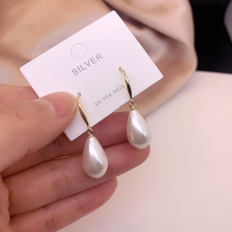 

Water drop pearl earrings women s fashion temperament design earrings high-end explosive earrings золотой