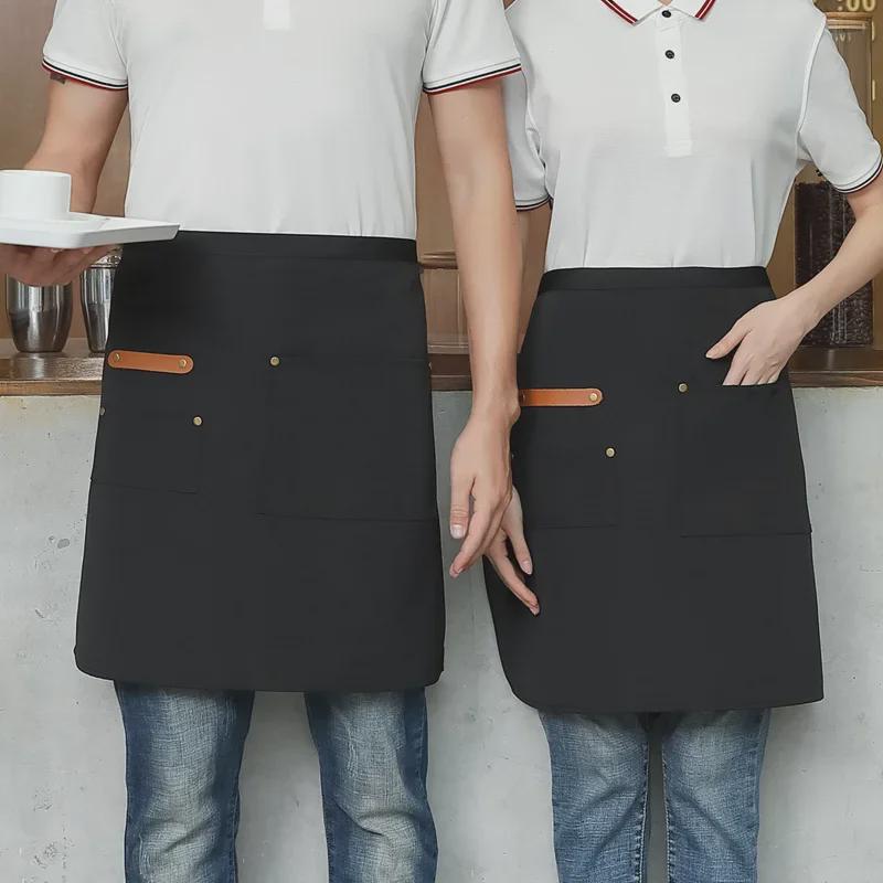 Unisex vanntett kjøkkenforkle i kanvas med halvlangt design og logo i midjen