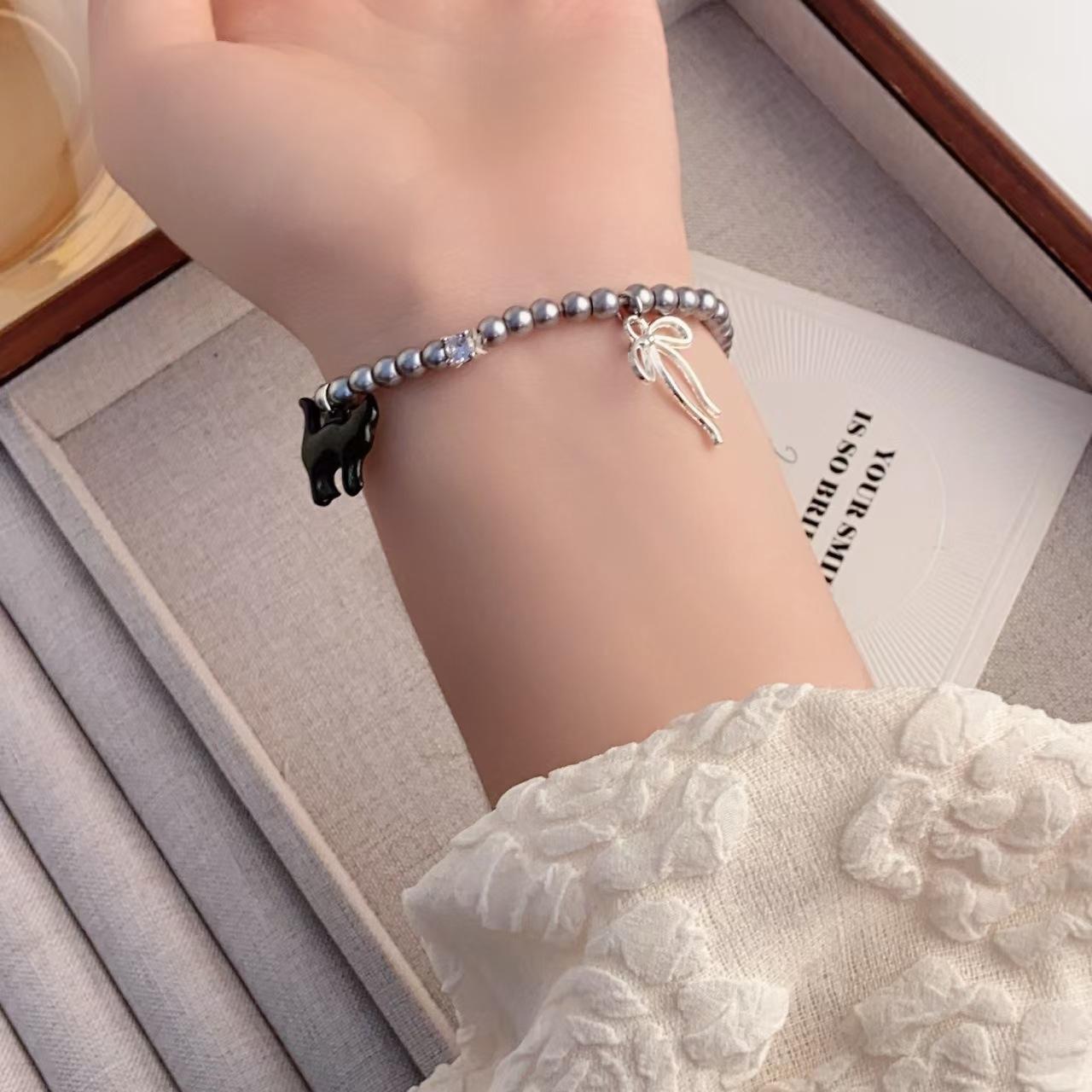 

Кошка Стильный Хай-энд Бант Жемчуг Ручной Аксессуар Браслет Для Женских Нарядов Лето чёрный