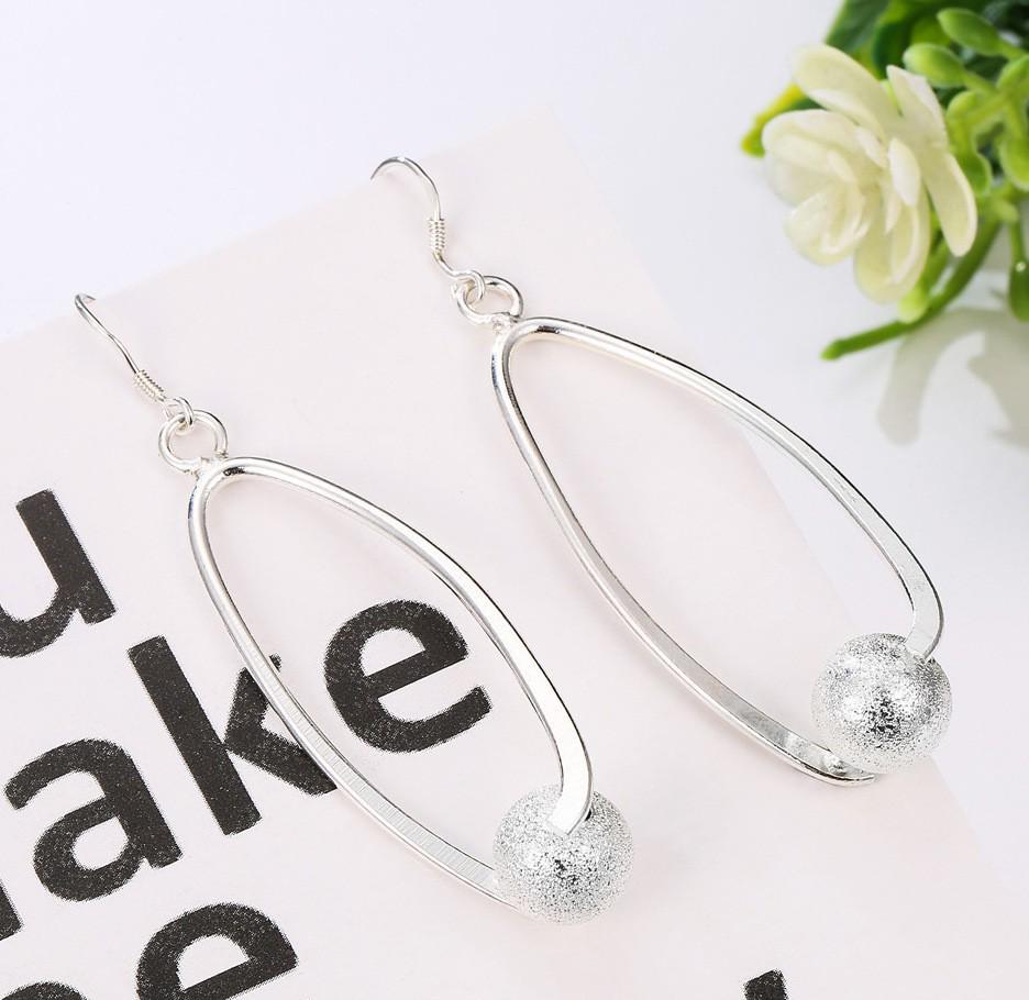 

TEMU Модные серьги-подвески с полыми овальными бусинами - Европейские и американские креативные украшения для женщин