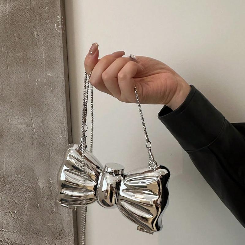 Mini Galvanisiert Silber Metall Glänzend Schleife Clutch Tasche Damen Personalisierte Mode Kette Kosmetik Crossbody Tasche Münzbeutel