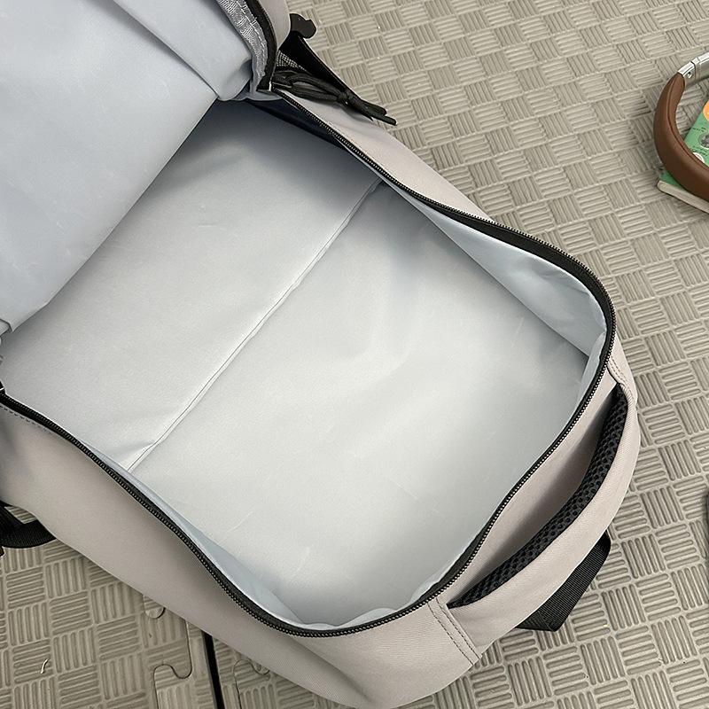 School bag 2025 new Korean version solid color couple backpack large capacity multi-compartment school bag casual simple versatile backpack