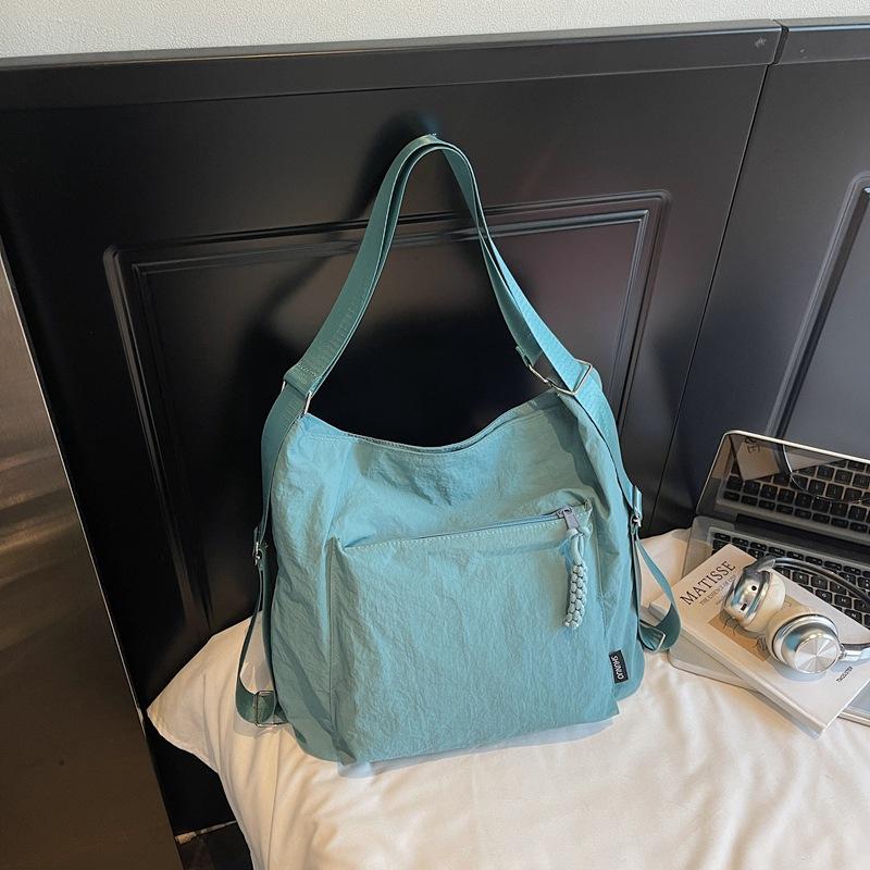 2025 Autumn New Messenger Messenger Bag Japanese Casual Nylon Shoulder Tote Bag Niche Commuter Messenger Bag