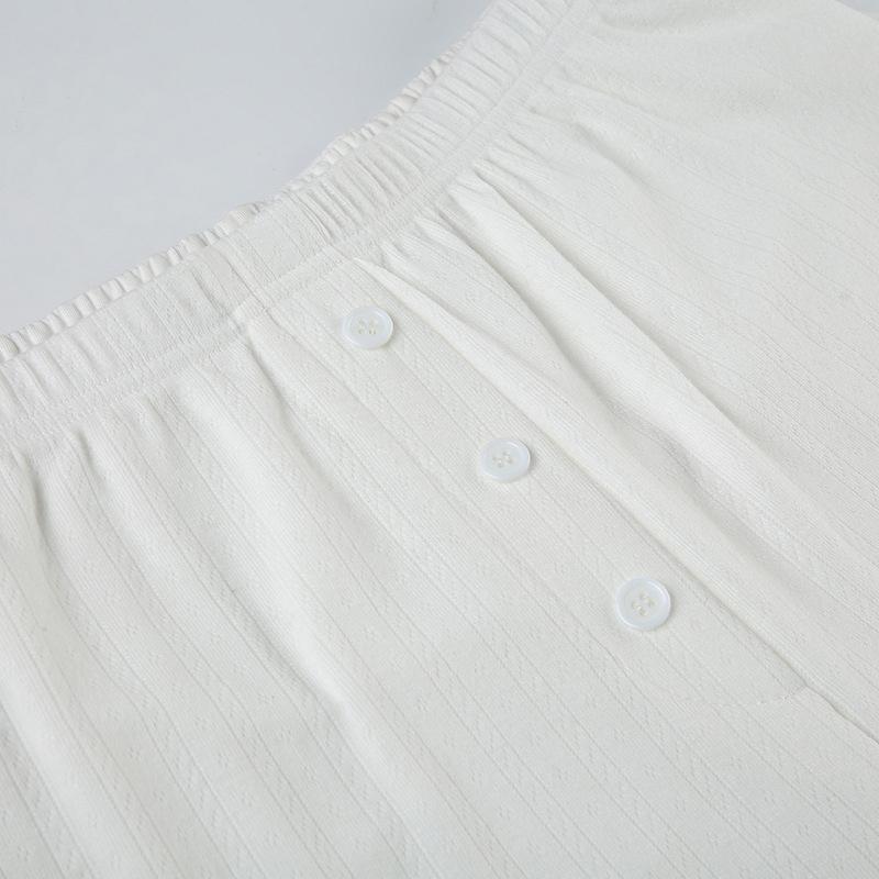 Jednobarevná pletená dvoudílná sada Dámský základní top s dlouhým rukávem a přezkou Elastické široké kalhoty Jednoduchý ležérní oblek Módní novinka jaro