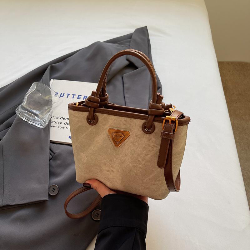 New product hot sale fashionable retro high texture women's hand bucket bag versatile commuter casual messenger bag