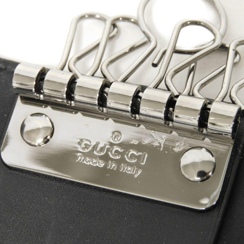 Used Guccissima 6-ring keychain (138093 7949) with double G embossing (9539) in black. Unisex. from Japan AUTHENTIC