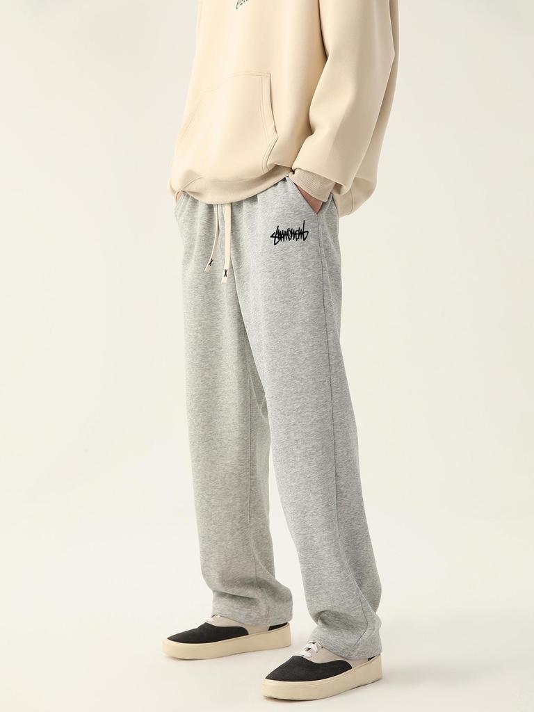 Pantalon de survêtement de sport décontracté ample pour homme le plus vendu avec étiquette de lavage en anglais - Style européen et américain