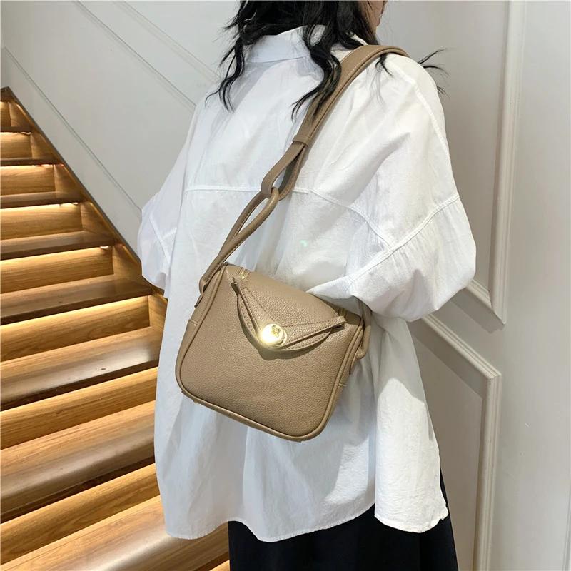 Bolso de hombro PU monocromático para mujer bolsos con línea de costura con cremallera suave   a la moda
