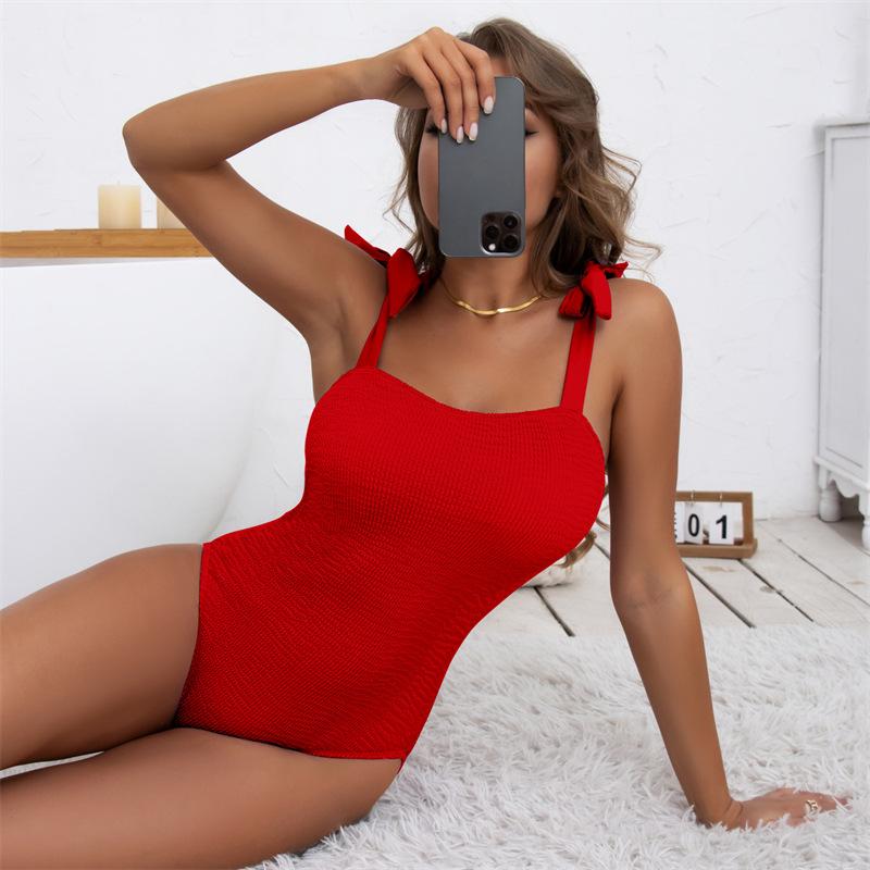 Costume da bagno intero a triangolo finto da donna in tessuto ondulato plissettato a tinta unita con lacci multicolore XL