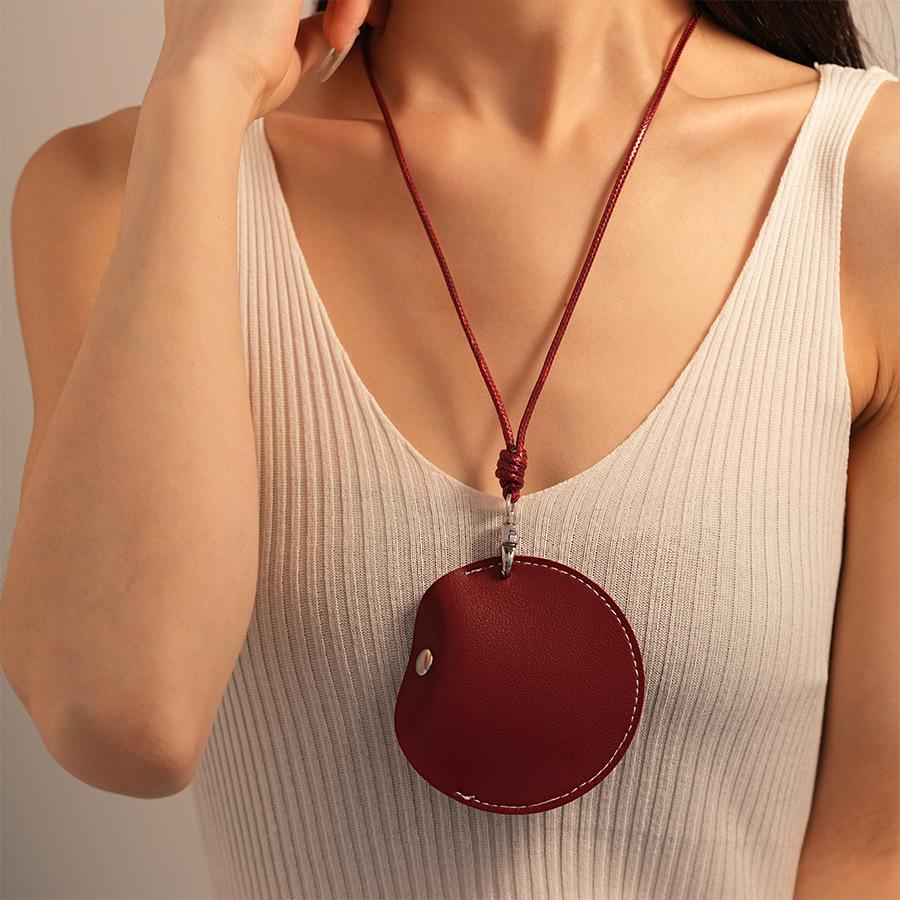 

Винтажное кожаное ожерелье Maillard с круглым кулоном-сумкой