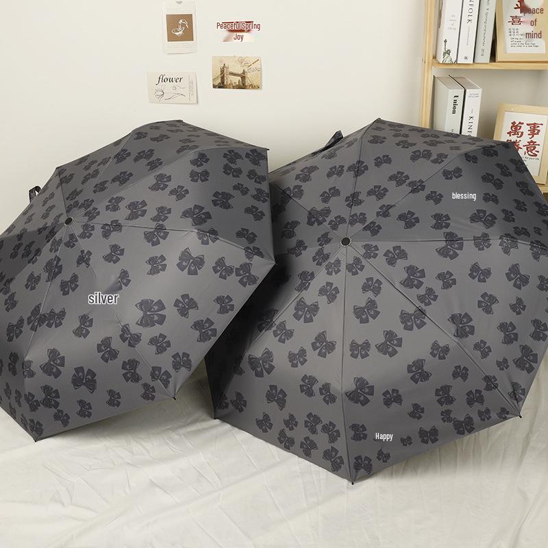 Women's Bow Sun & Rain Dual-Use Automatic Folding Umbrella - Compact, Fresh Sunshade with Black Glue for Sunscreen Protection.