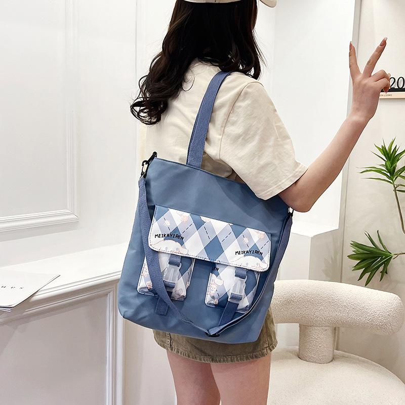 Large-capacity student tutoring bag, new women's bag, fashionable contrasting color messenger bag, shoulder bag.