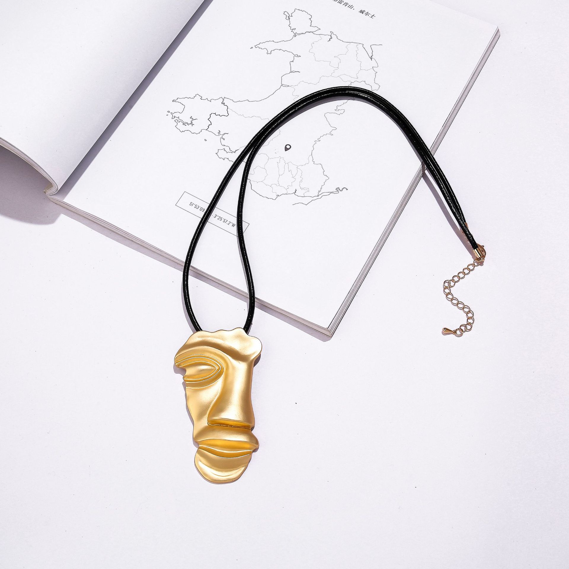 Fashion Personality Premium Sense Face Leather Rope Women S Pendant Necklace Long Sweater Chain