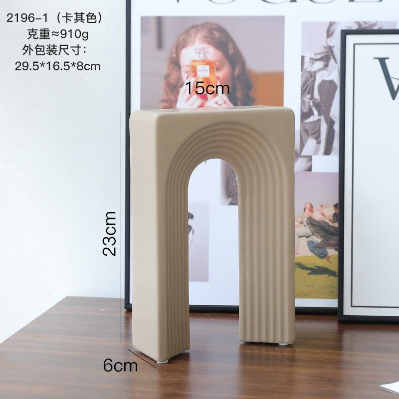 

Високоякісна керамічна геометрична ваза. Світла розкішна керамічна ваза. Нерегулярна офісна книжкова полиця. Модель. Прикраси для домашнього входу.