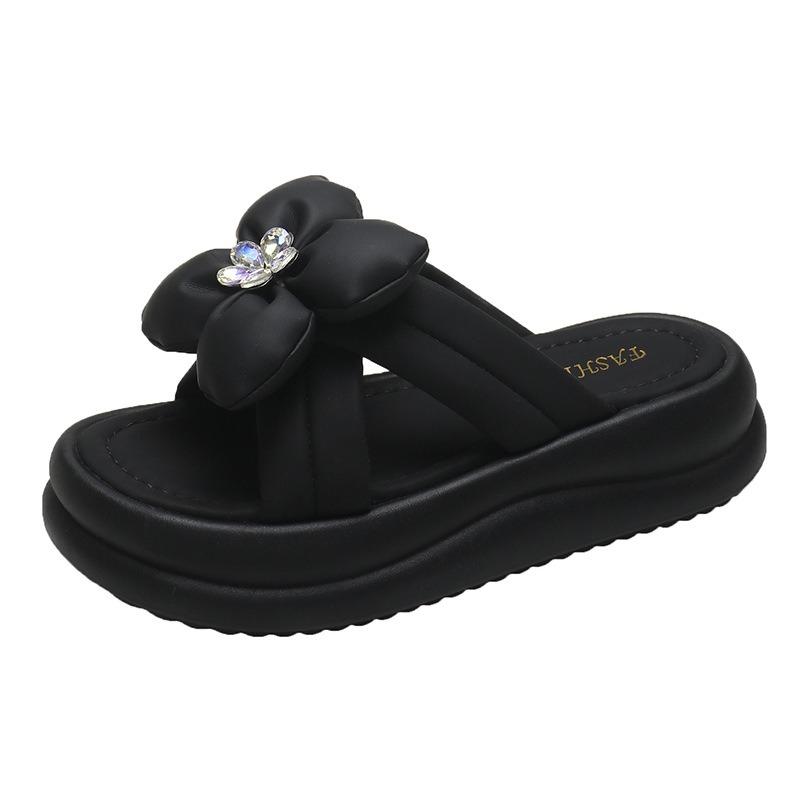 

Крутые шлепанцы на толстой подошве женские популярные летние новые модные со стразами и цветком пляжные шлепанцы женские 40 чёрный
